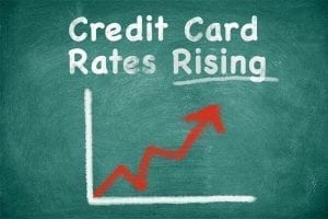 Chalkboard with graph of rising credit card rates