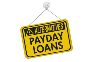 Yellow sign hanging that reads "Alternatives Payday Loans"