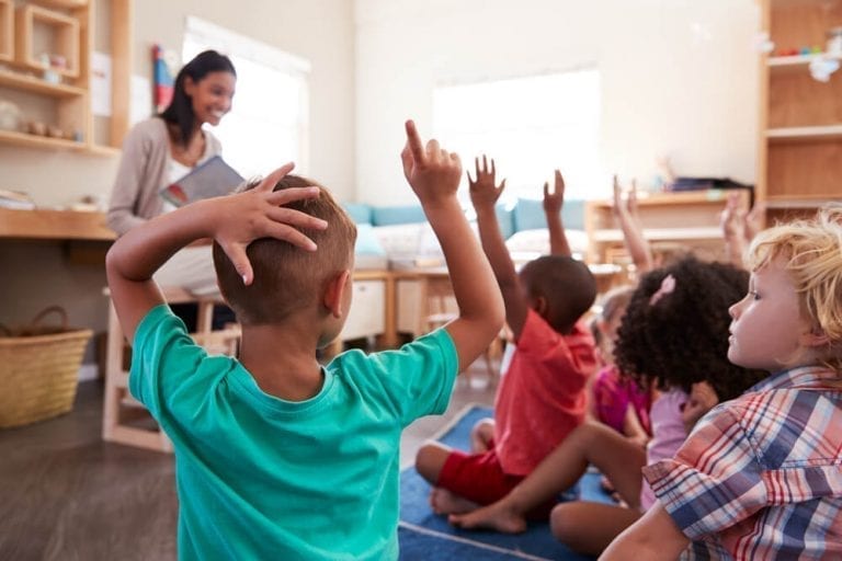 Teacher in Classroom with Students