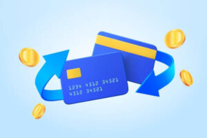 Credit card and flying coins on blue background.