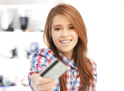 Young woman with credit card